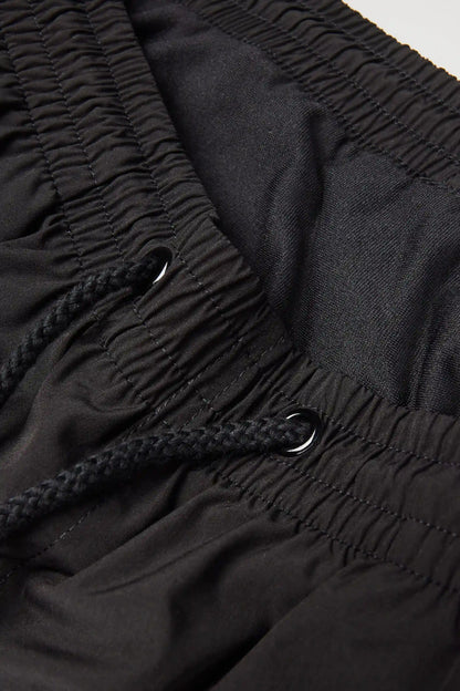 Short Solid Color Swim Trunks