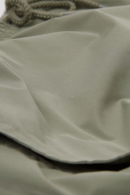 Mid-Length Solid Color Swim Trunks